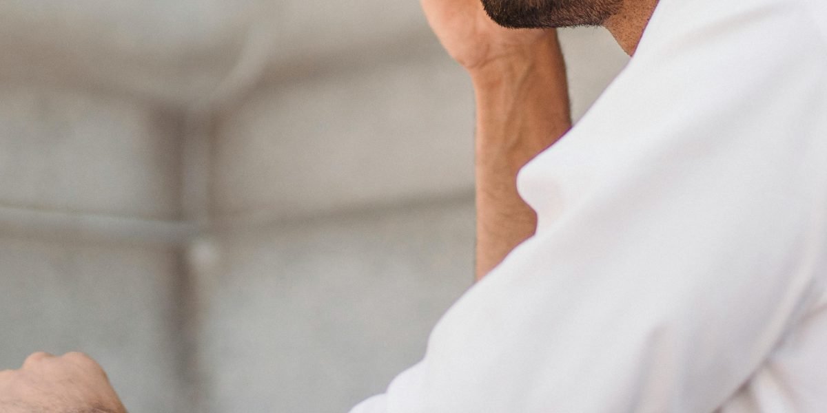 A person reflecting deeply, perhaps on a complex idea or a life-changing realization.