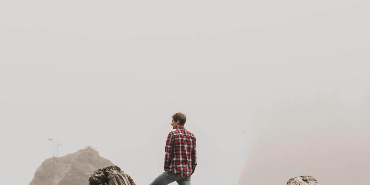 A person in a thoughtful pose, contemplating past connections and the meaning of life experiences.